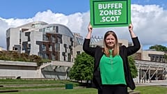 FILE - Green MSP Gillian Mackay stands outside the Scottish Parliament, Holyrood, in Edinburgh