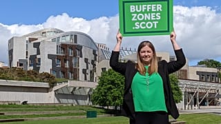 FILE - Green MSP Gillian Mackay stands outside the Scottish Parliament, Holyrood, in Edinburgh