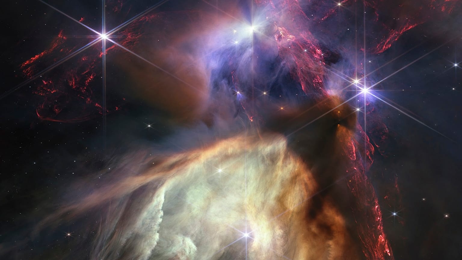 A picture from James Webb Telescope showing the birth of a star as never seen before. The subject is the Rho Ophiuchi cloud complex, the closest star-forming region to Earth.