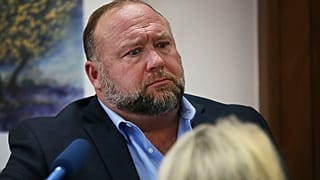In this Aug 3, 2022 file photo, conspiracy theorist Alex Jones attempts to answer questions about his emails during trial at the Travis County Courthouse in Austin.
