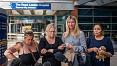 Hollie Dance, second left, surrounded by family and friends, outside the Royal London hospital following the death of her 12 year old son Archie Battersbee, August 6, 2022.