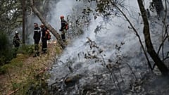 Firefighters have started "tactical fires" to prevent the flames from spreading.