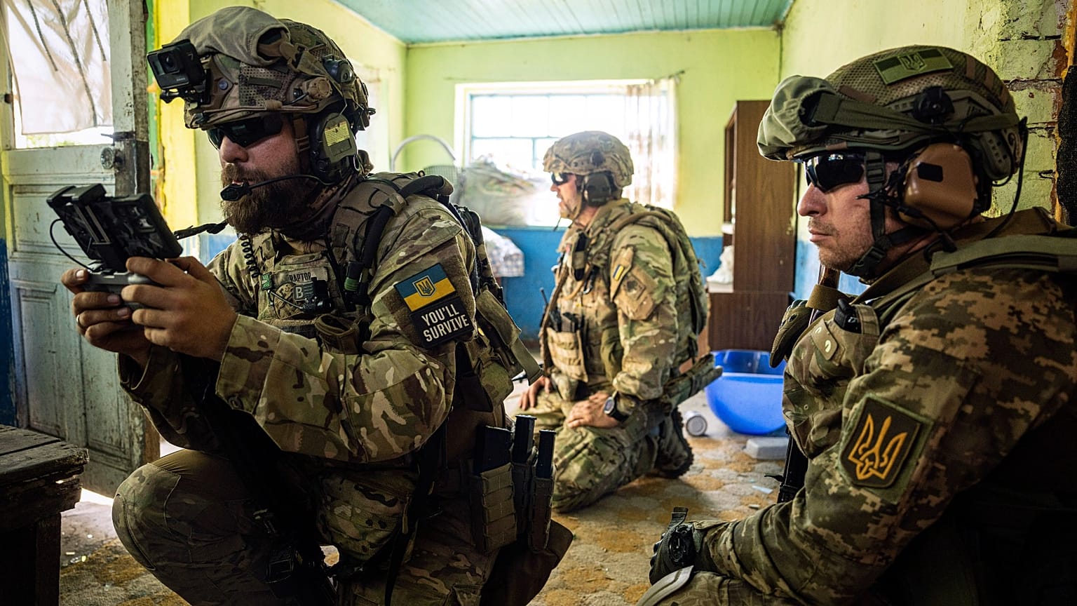 A Ukrainian serviceman of "Fireflies" reconnaissance team operates a drone at his position on the frontline in Mykolaiv region. 