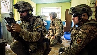 A Ukrainian serviceman of "Fireflies" reconnaissance team operates a drone at his position on the frontline in Mykolaiv region. 