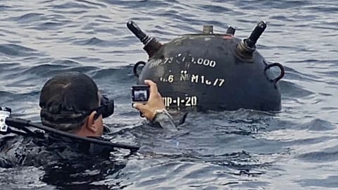 Diver snaps a photo of a floating Ukrainian sea mine in the Black Sea 
