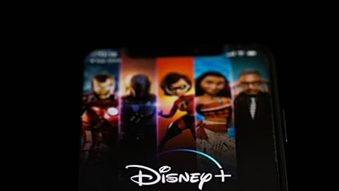(FILES) This file illustration photo taken on May 27, 2020, shows the logo of the US video on demand application Disney+ on the screen of a phone in Paris