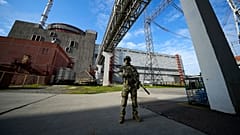 A Russian serviceman guards in an area of the Zaporizhzhia Nuclear Power Station on 1 May 2022