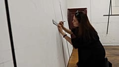 Sofiia Yesakova works on her latest piece in Berlin