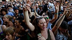 Revelers dance during the 24th Advanced Music and Multimedia Art International Sonar Festival in Barcelona, Spain, Friday, June 16, 2017.