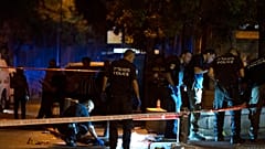 Israeli police work at the scene of the shooting near the Old City of Jerusalem, August 14, 2022.