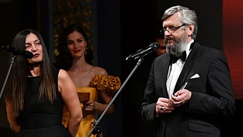Ukrainian film maker Sergei Loznitsa (R) addresses audience as he receives honorary "Heart of Sarajevo" award at the Sarajevo Film festival, 12 August, 2022.