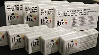 Iodine pills stop radioactive iodine from being absorbed into thyroid glands, which can develop cancer if infected