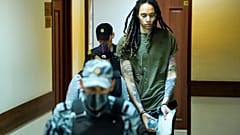 Brittney Griner is escorted to a courtroom prior to a hearing, in Khimki, Russia, 2 August, 2022. 