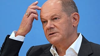 FILE: German Chancellor Olaf Scholz addresses the media during his first annual summer news conference in Berlin, Germany, Thursday, Aug. 11, 2022.