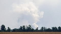 A view shows smoke rising above the area following an alleged explosion in the village of Mayskoye in the Dzhankoi district, Crimea, August 16, 2022.