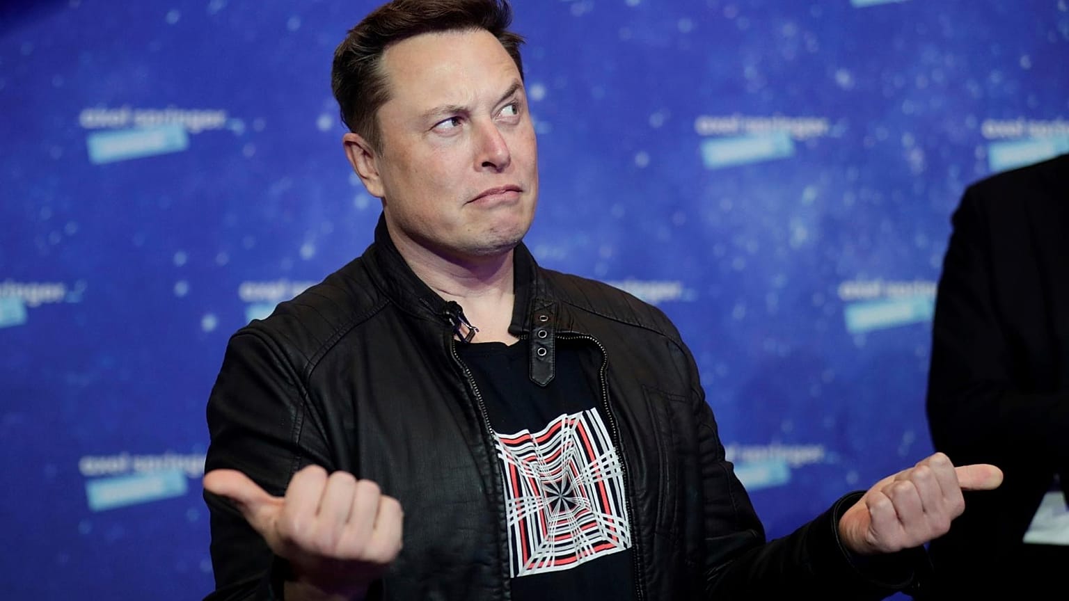SpaceX owner and Tesla CEO Elon Musk arrives on the red carpet for the Axel Springer media award, in Berlin, Germany, Tuesday, Dec. 1, 2020.