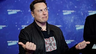 SpaceX owner and Tesla CEO Elon Musk arrives on the red carpet for the Axel Springer media award, in Berlin, Germany, Tuesday, Dec. 1, 2020.