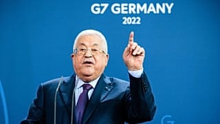Palestinian President Mahmoud Abbas spoke during a news conference with German Chancellor Olaf Scholz at the Chancellery in Berlin on Tuesday.
