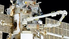 Oleg Artemyev e Denis Matveevdurante a caminhada espacial na ISS