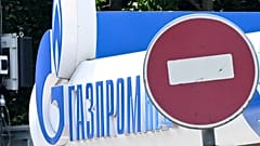 The logo of Russia's energy giant Gazprom is pictured at one of its petrol stations in Moscow on July 11, 2022.