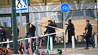 Policemen arrive at the scene of shooting at Emporia shopping centre in Malmo, Sweden, Friday, 19 Aug., 2022.