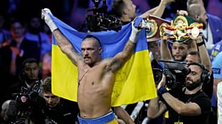 Ukraine's Oleksandr Usyk celebrates after beating Britain's Anthony Joshua to retain his world heavyweight title