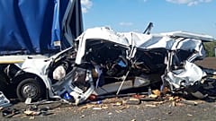 The Minibus was left severely damaged after the crash with two trucks.