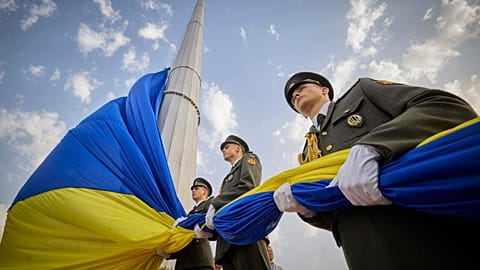 Ukrainian honour guard soldiers prepare to rise the Ukrainian national flag during State Flag Day celebrations in Kyiv, Aug. 23, 2022. 