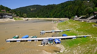 Boats left on a dry lake on the border of France and United Kingdom