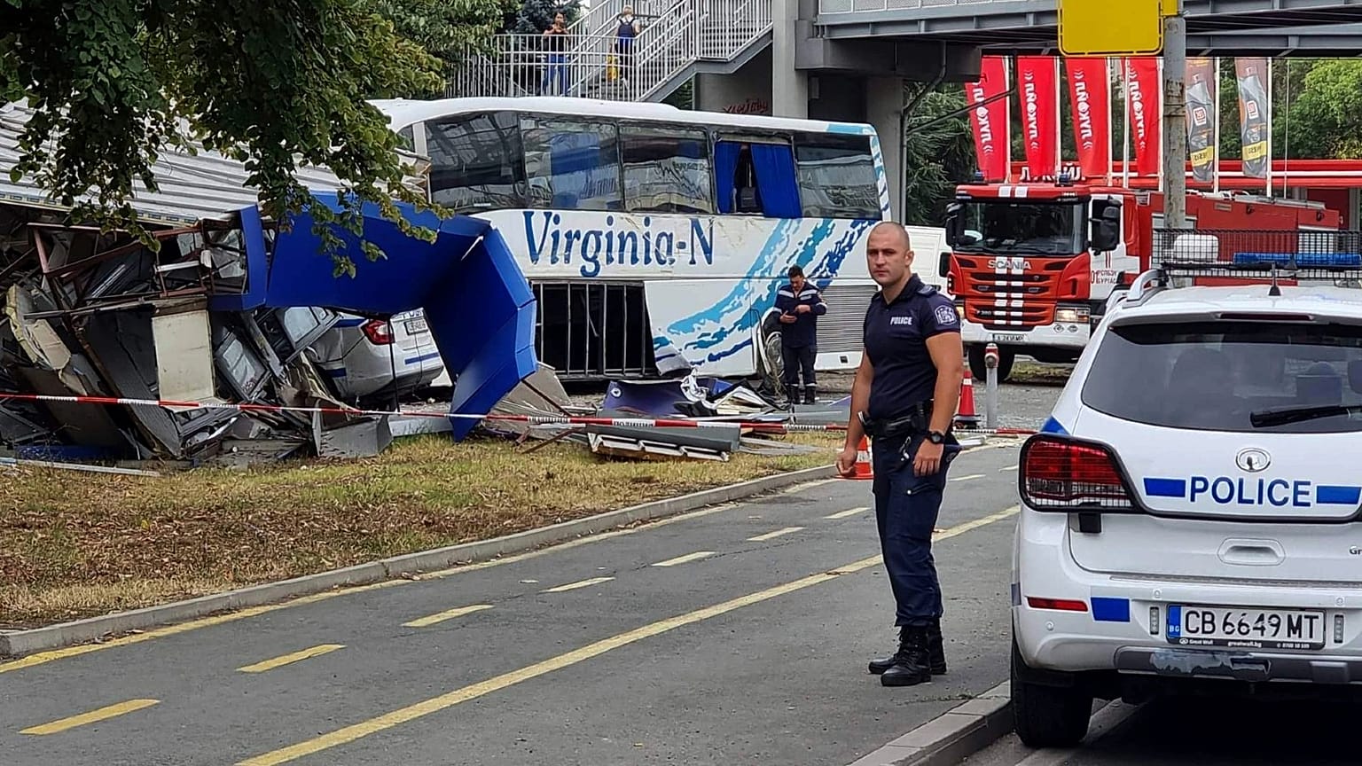 In this photo provided by the Bulgarian News Agency, a police man stands near the scene of an incident, in the Black Sea city of Burgas, Bulgaria, Thursday Aug. 25, 2022. 