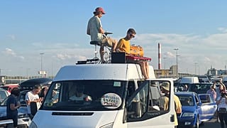 Hundreds of motorists watched the musicians as they waited to cross the France-UK border