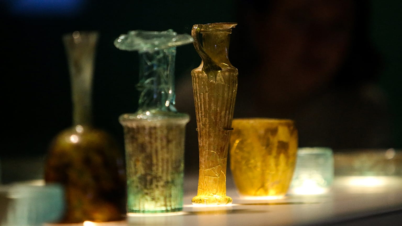 The newly conserved ancient glass vessels damaged during the 2020 Beirut port explosion  displayed at the British Museum in London