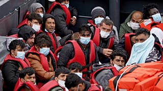 People thought to be migrants are brought in to Dover, Kent, England, following a small boat incident in the Channel, Monday July 11, 2022