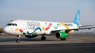 An aircraft of the low-cost of Wizz Air airlines painted in the colours of the logo of host city candidate Budapest for the 2024 Olympic and Paralympic Games.