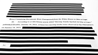 Pages from the affidavit by the FBI in support of obtaining a search warrant for former President Donald Trump's Mar-a-Lago estate are photographed Friday, Aug. 26, 2022.