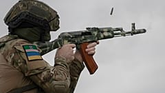 A volunteer soldier attends a training outside Kyiv, Ukraine, Saturday, Aug. 27, 2022. 