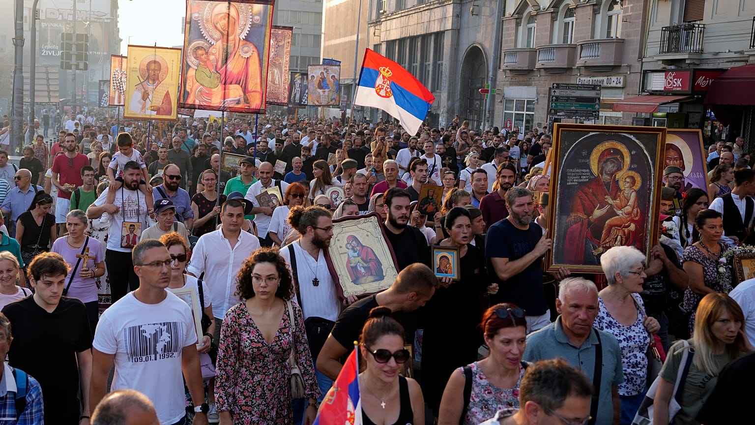People march during a protest against the international LGBT event EuroPride in Belgrade, Serbia, Sunday, Aug. 28, 2022. 