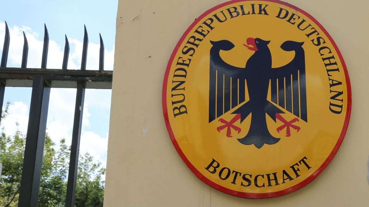 The entrance of a German Embassy is displayed.