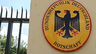The entrance of a German Embassy is displayed.