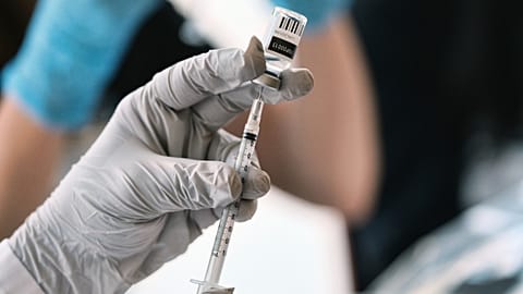 Registered pharmacist Sapana Patel, loads a syringe with Monkeypox vaccine at a vaccination site on Wednesday, Aug. 3, 2022.