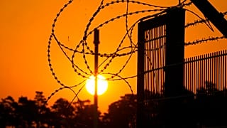 Barbed wire secures the entrance of the harbour area where the landfall of the Nord Stream 1 Baltic Sea pipeline is located, Thursday, 21 July, 2022.