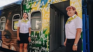 Rail workers stand by the 'Train to Victory'
