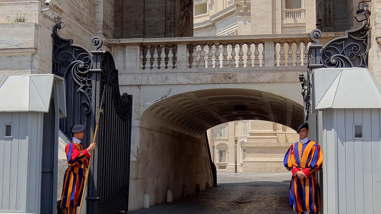  Two members of the Swiss Guards on duty at one of the entrances to the closed-off parts of The Vatican