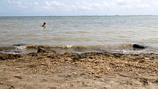 A woman bathes in the Mar Menor, Los Alcazares, Murcia, Spain.
