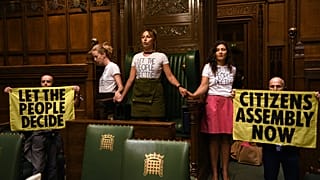 Climate activists glued themselves together around the Speaker's Chair in UK parliament