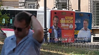 The electoral posters of the Northern League (left) and the Five Star Movement (right) on buses in Rome, Italy, on 1 September 2022.