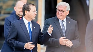 Israeli President Isaac Herzog, left, and German President Frank-Walter Steinmeier, right.