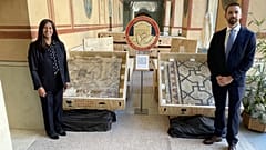 FBI agents pose with the 2,000 year old mosaic
