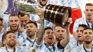 Lionel Messi lifts the Copa America for Argentina in 2021