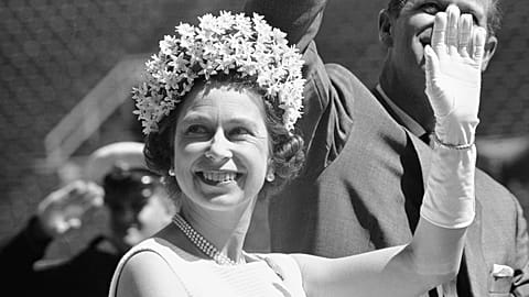 Queen Elizabeth II waves to children at a party in Ottawa's Lansdowne Park in 1967